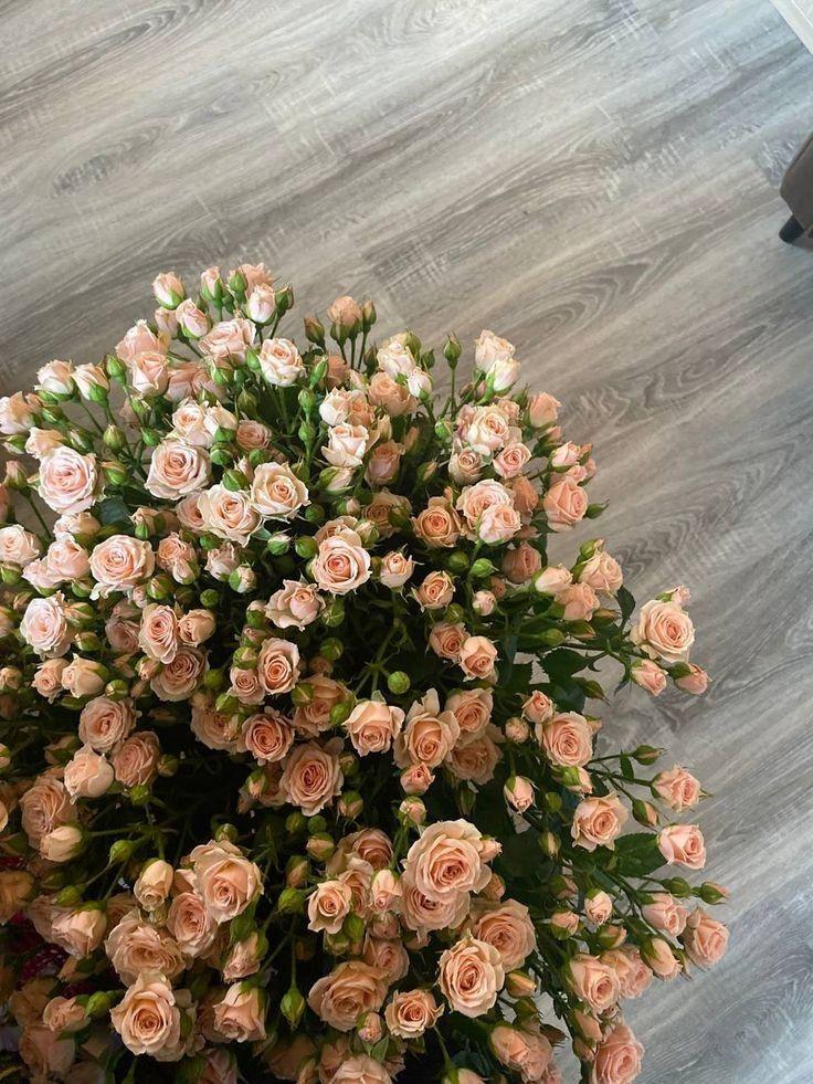 Corporate meeting room with carefully timed floral arrangements that maintain elegance throughout business hours